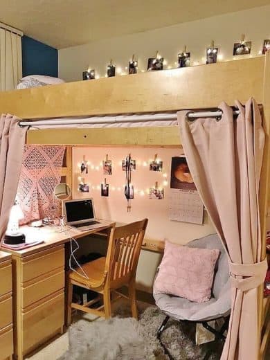 Lofted bed with curtain for privacy and fairy lights. What not to do to your dorm. DIY Dorm room ideas for college. #College #dorm #diy #Collegedorm