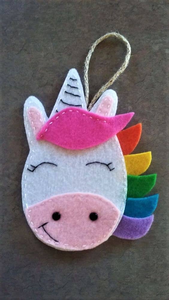 Easy DIY Felt Unicorn Christmas Ornament craft, and gift idea. Great for kids, teens, friends, teachers, and an ornament making party.