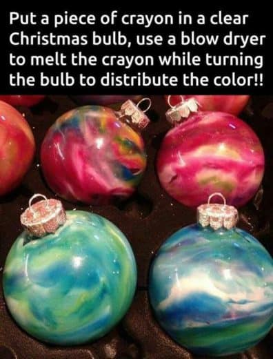 Easy DIY Crayon Christmas Ornament craft, and gift idea using a glass ball ornament, crayons, and a blowdryer. Great for kids, teens, friends, teachers, and ornament making party.