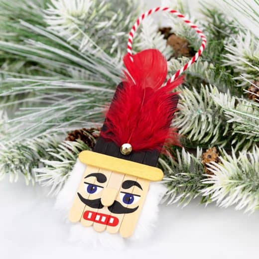 Easy DIY Nutcracker Popsicle Ornament. Simple yet beautiful dollar store craft gift idea anyone can make, even kids.